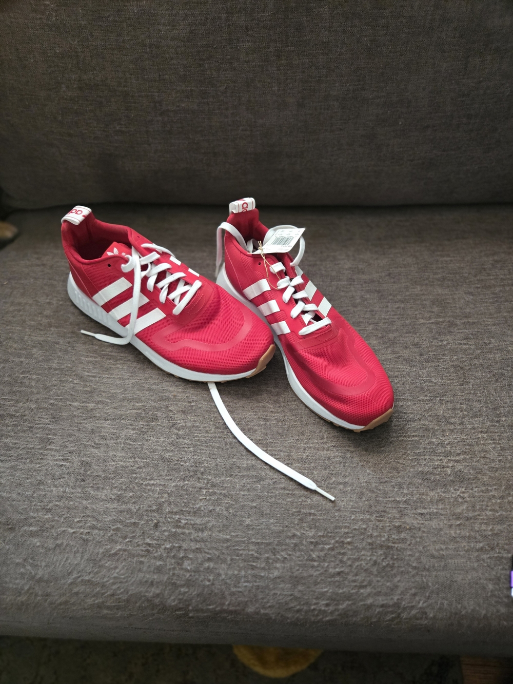 Adidas Red Athletic Sneakers with White Stripes